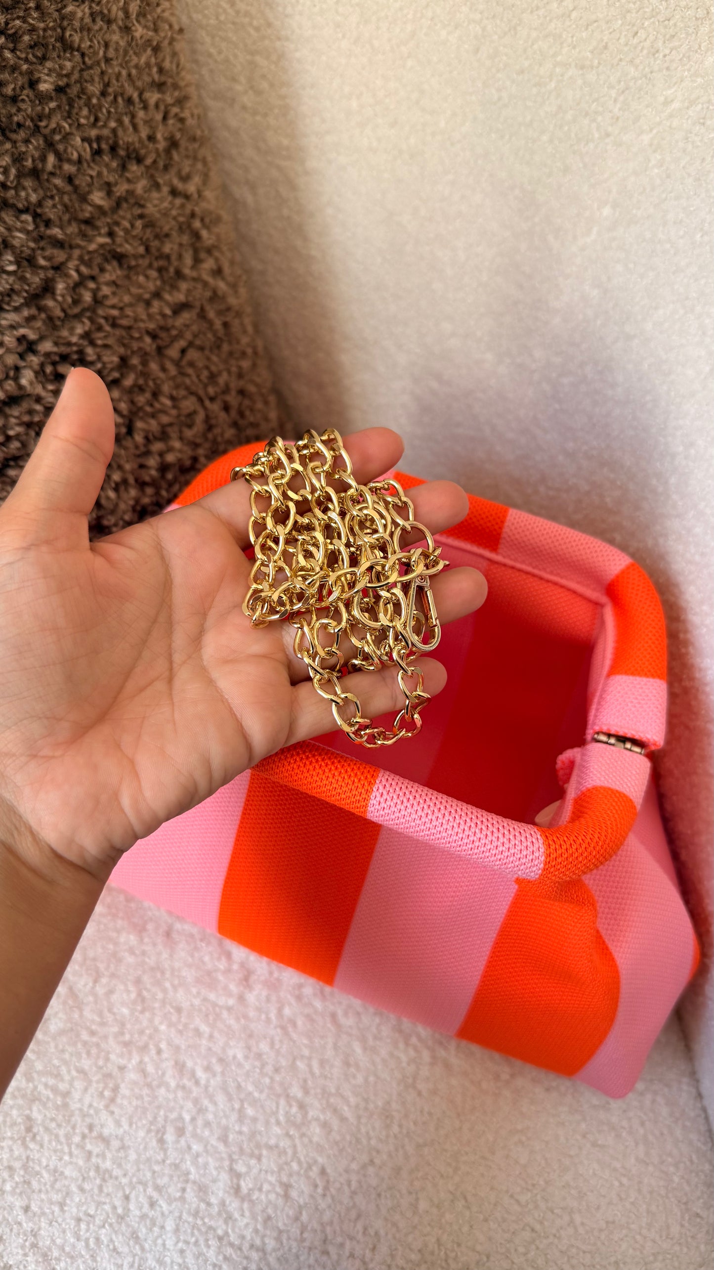 Pochette à rayures rose et orange