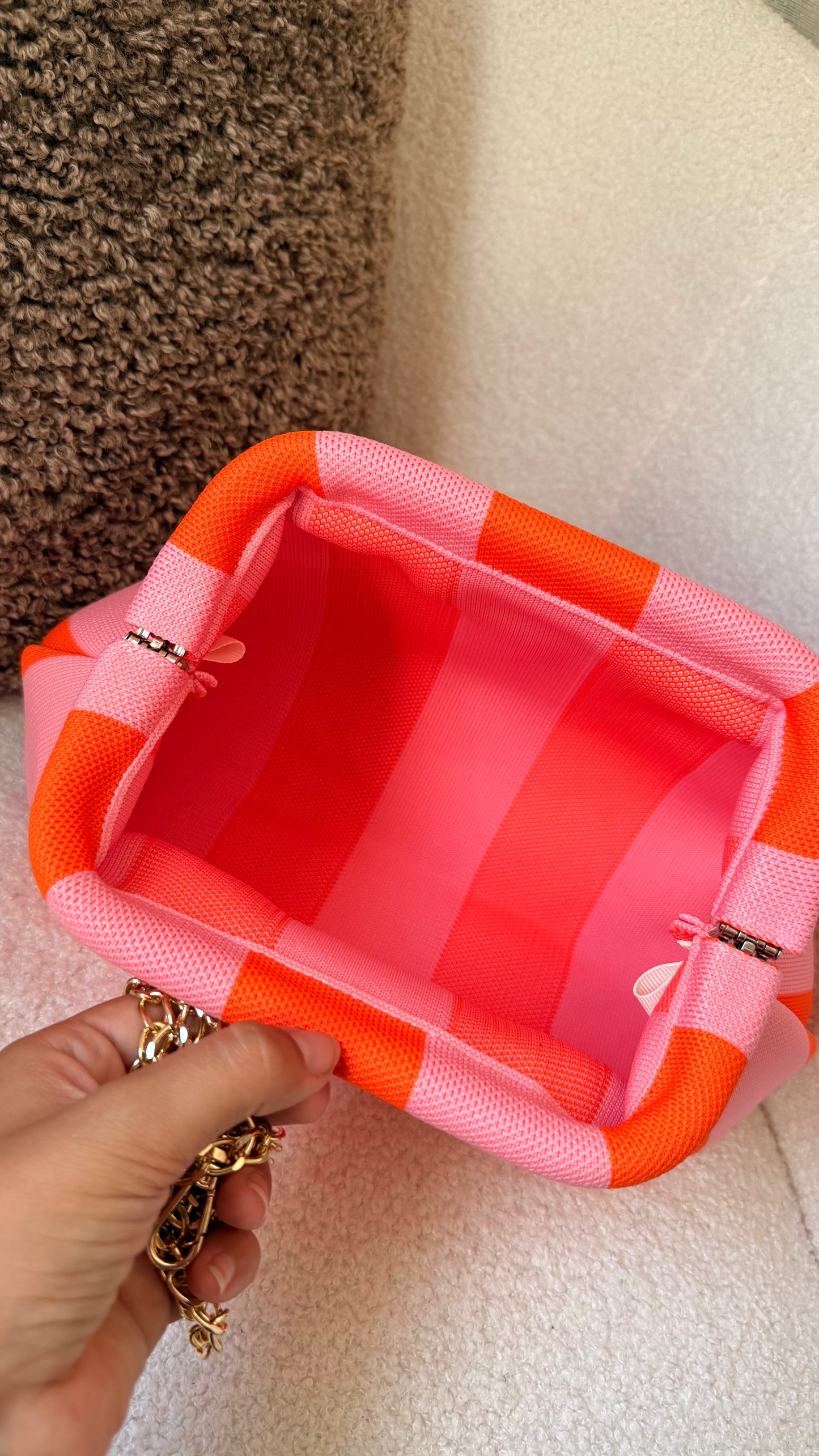 Pochette à rayures rose et orange