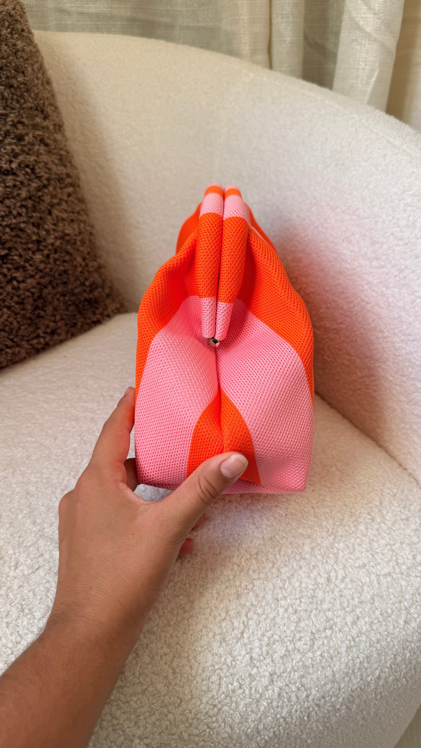 Pochette à rayures rose et orange