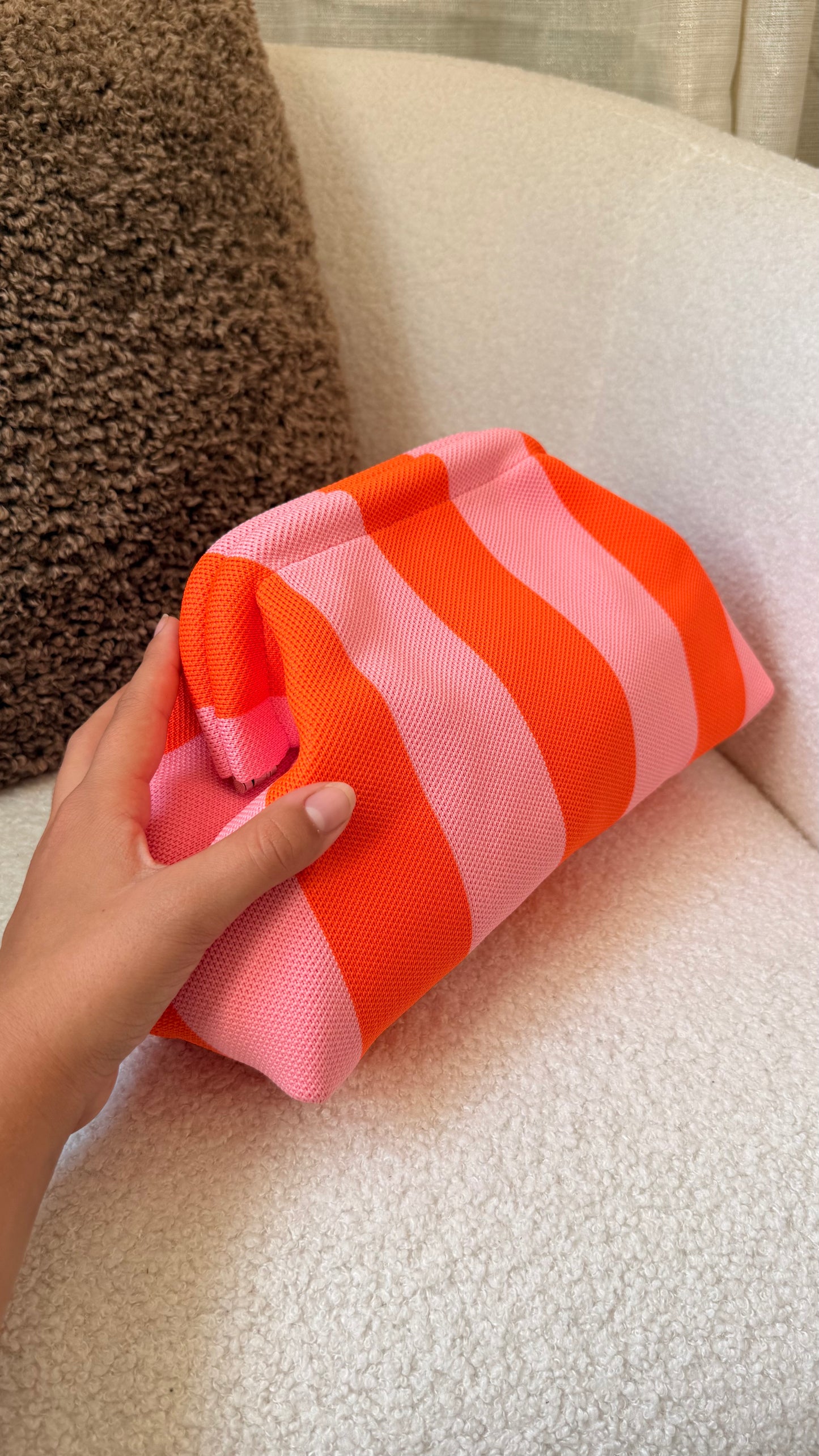Pochette à rayures rose et orange