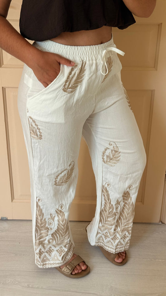 Pantalon brodé motifs feuillages